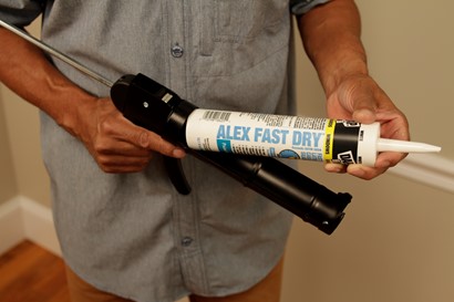 load caulk gun